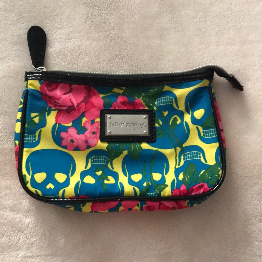 Betsy Johnson cosmetic bag.